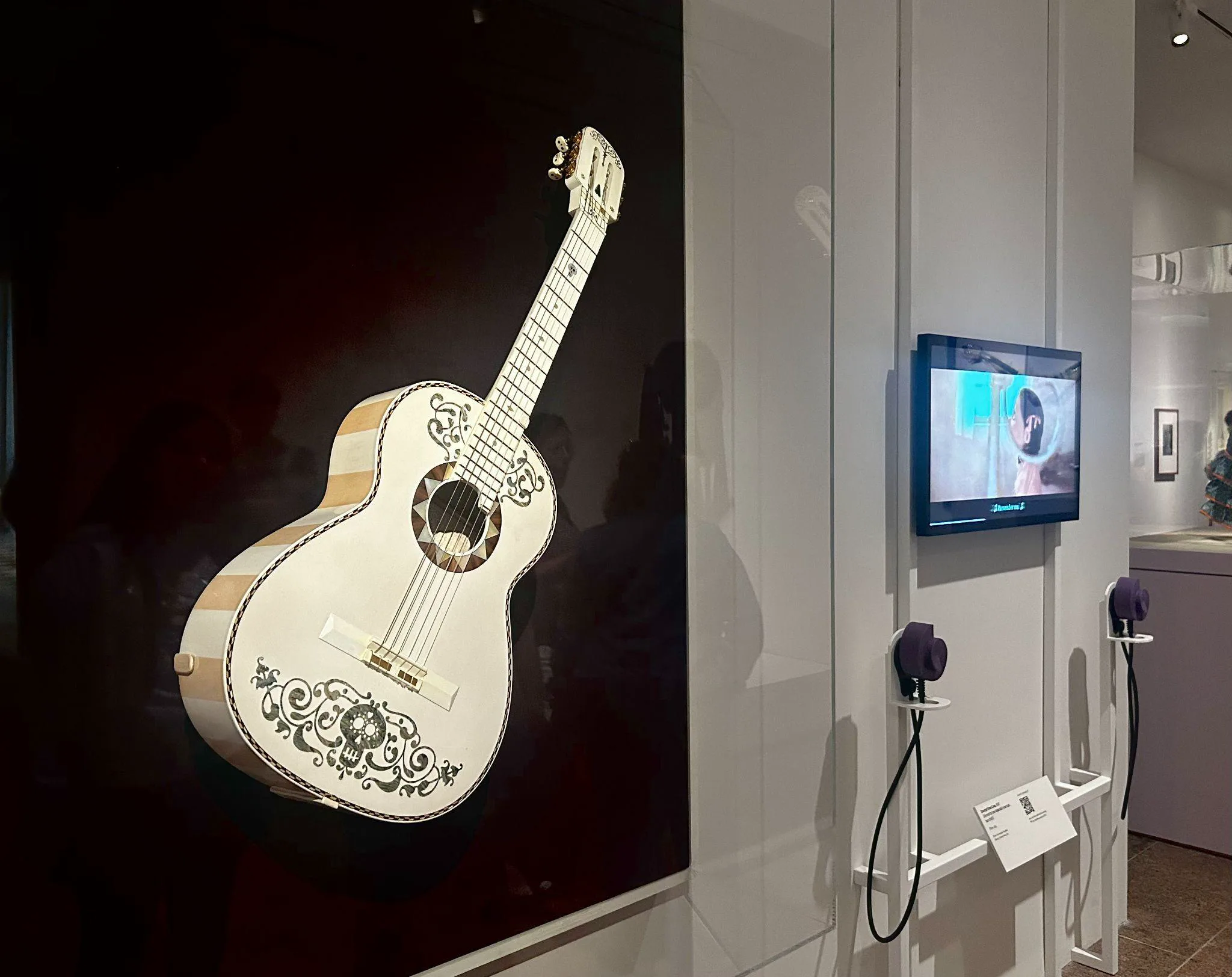 Clips from the movie Coco and the guitar replica. Photo: Lanney Jing.